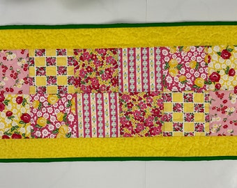 31 1/2” x 13 3/4” yellow, pink, white, and green table topper