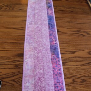 42” x 8 1/2”  orchid and blue batik table runner