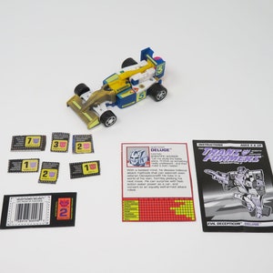 Vintage 1990s Transformers Generation 2 Aquaspeeder Evil Decepticon Deluge Toy Figure Complete Race Car Robot Color Changer
