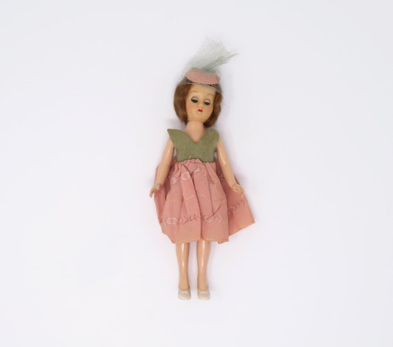 Vintage 1950s to 1960s Hard Plastic Dress Me Doll – Pink Retro