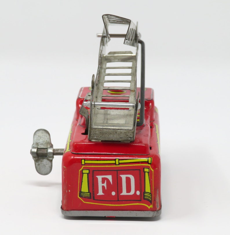 Vintage 1960s Mechanical Wind Up Tin Yone Japan Self Extending Ladder Fire Engine Emergency Truck Metal Toy Collectible Fun