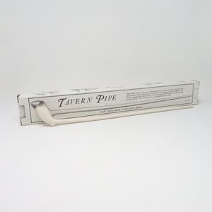 May include: A white Tavern Pipe in its original packaging. The box is white with black text that reads "Tavern Pipe" and includes an illustration of the pipe. The packaging also includes text that reads "For the best Virginia weed."