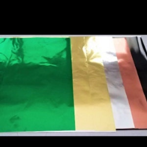 May include: Set of 6 Mylar sheets in green, gold, silver, copper, and black. Each sheet measures approximately 9 inches by 10 inches.