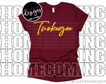 May include: A maroon t-shirt with the text "Tuskegee Homecoming" in yellow lettering.