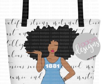 May include: A white tote bag with a black handle and a design of a woman with an afro, wearing a blue tank top with the number 1881 on it. The background is covered with a white script.