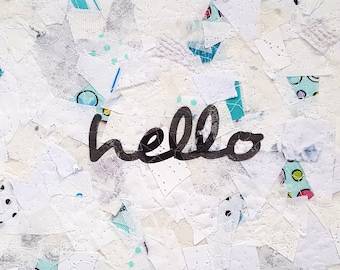 Hello, fiber art collage, 7" x 5" wall hanging, black ink on recycled fabrics