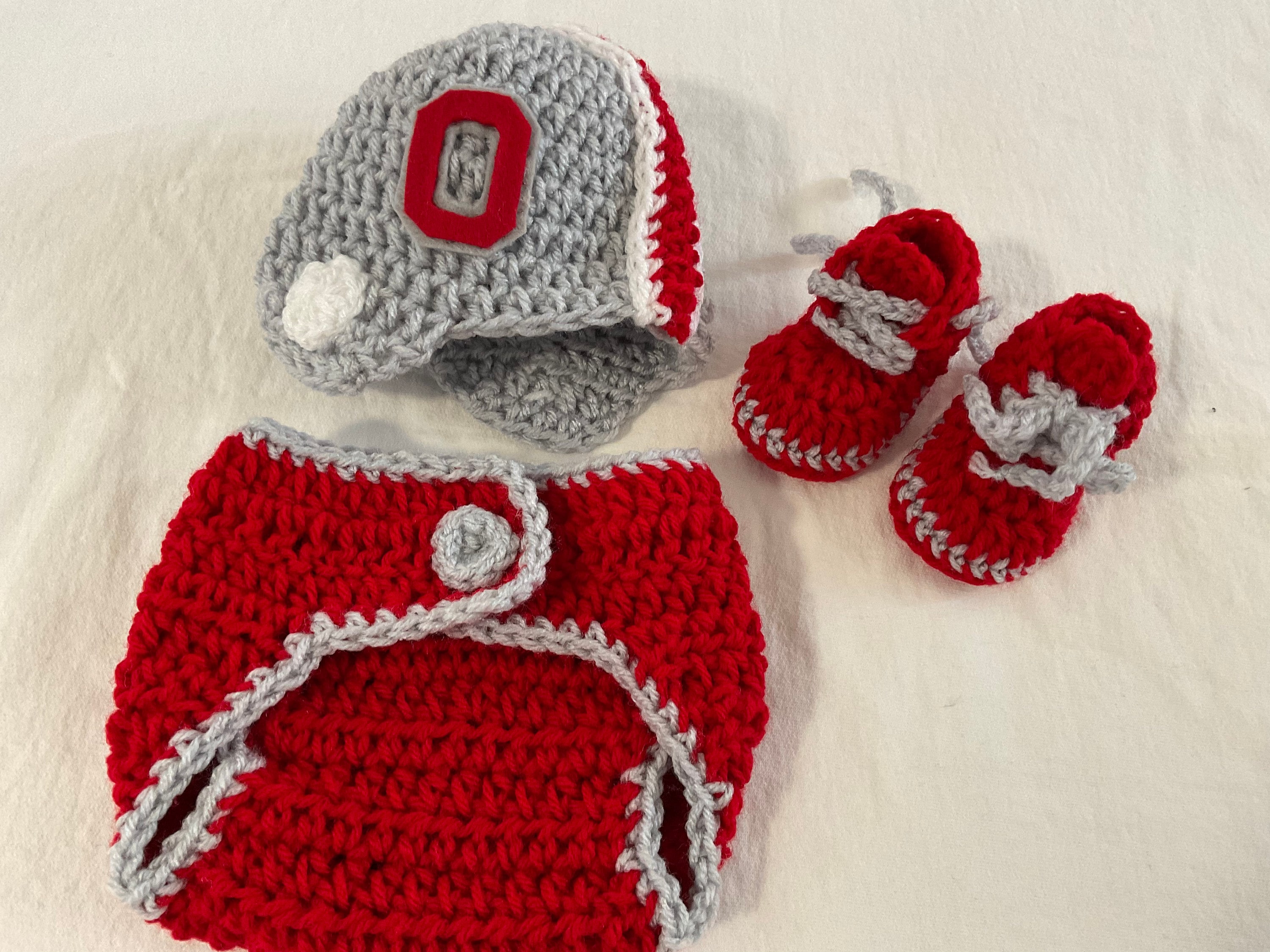 alabama football helmet for newborn pics Nora Fleming Mini University changes in dye lots NCAA Alabama Crimson Tide Newborn