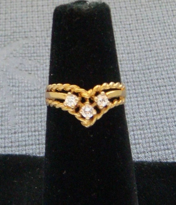 English 9 karat yellow gold .31 carat ring. Size 7