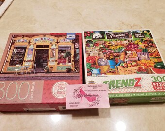 Two Puzzles 300 pc Farmers Market & Guido Borelli  Casa America 1946 18" x 24" Fun Colorful Milton Bradley Master Pieces Free Ship Cont US