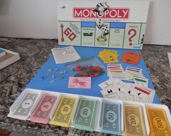 Monopoly Game Vintage Pieces Tokens House Hotel Money Chance Community Chest Cards Real Estate Cards Very Good Condition  by Parker Brothers