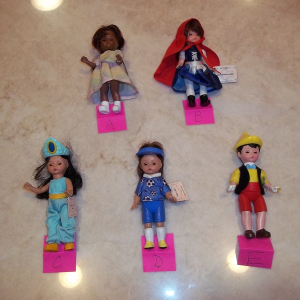 Madame Alexander McDonalds Dolls Pinnocchio, Red Riding Hood, Kick it Soccer Girl, Jumping Rope and Wendy as Jasmine