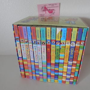 May include: A boxed set of children's books with colorful spines. The books are titled with the name "Cleary" and feature titles like "Ramona" and "Beezus". The box is decorated with illustrations and text.