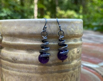 Forged iron spiral and amethyst earrings