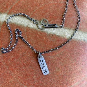 Date stamped pendant on oxidized sterling silver chain