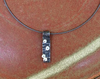 Hand forged iron and freshwater pearl pendant on round sterling silver cable necklace (narrow)