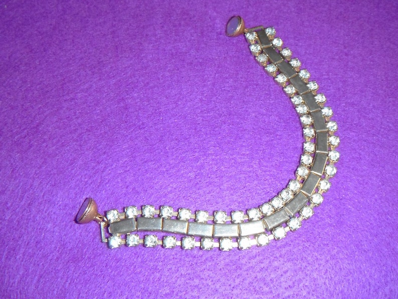 Sparkling jointed and banded bracelet with magnetic clasp