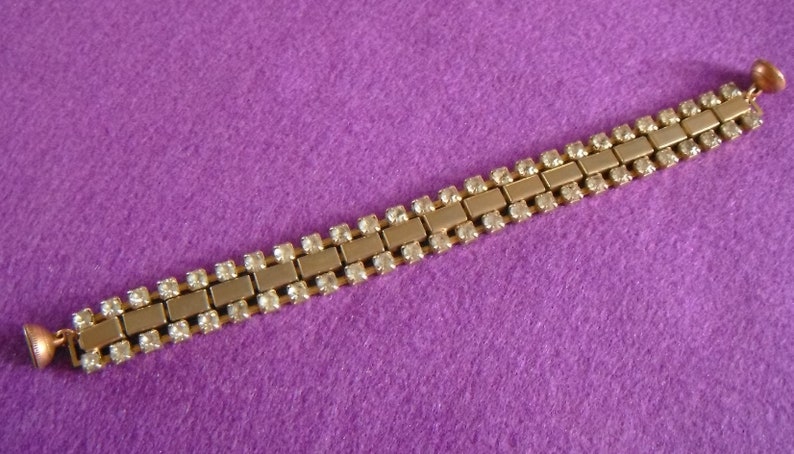Sparkling jointed and banded bracelet with magnetic clasp