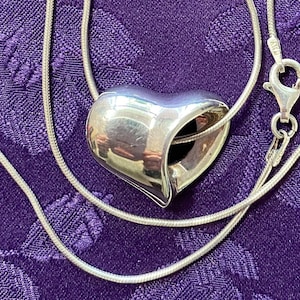 Sterling Silver floating heart necklace on delicate snake chain -