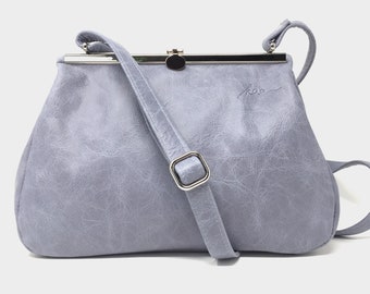 Borsa in pelle da donna azzurra con chiusura a clip borsetta in pelle blu