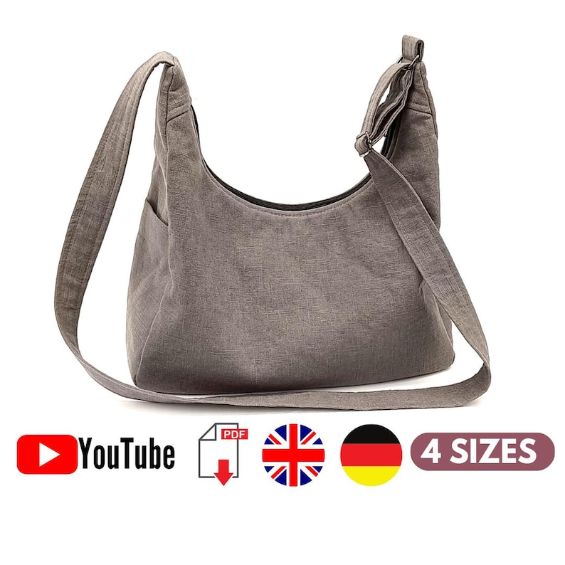 May include: A grey canvas shoulder bag with a long strap. The bag has a simple design and is perfect for everyday use. The image includes the text "4 SIZES" and icons for YouTube, PDF download, the United Kingdom, and Germany.