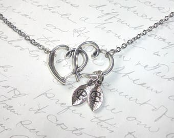 Double hearts intertwined necklace with personalized initial charms