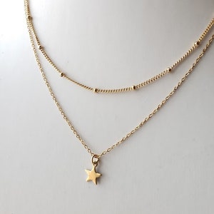 Gold chain layered necklace with star pendant image 1