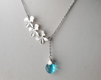 Orchid flower cascade necklace with turquoise glass drop