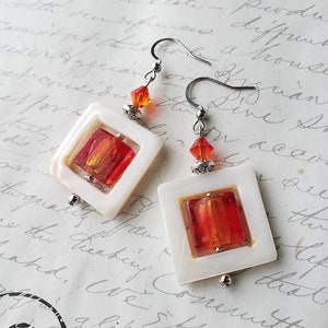 Orange murano glass tile earrings with white shell frames