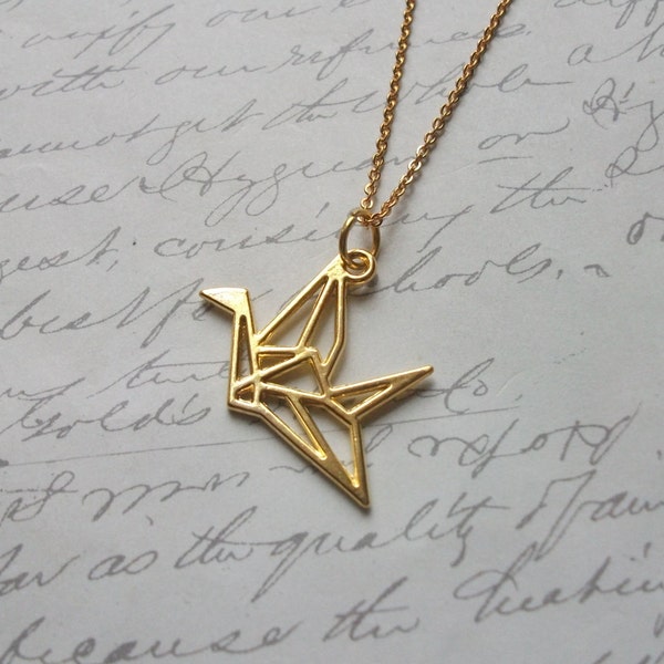 Collier or a pendentif oiseau origami