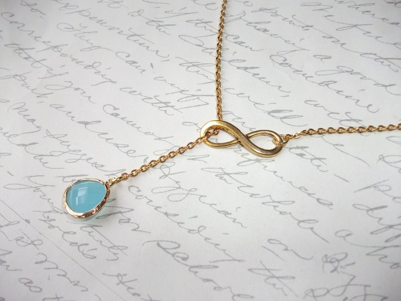 Infinity gold lariat necklace with turquoise drop