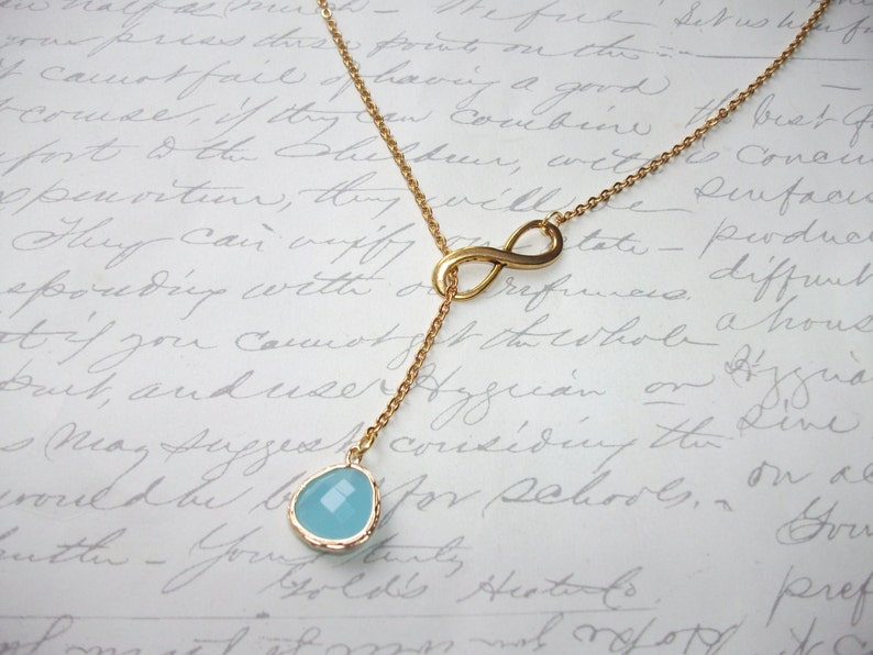 Infinity gold lariat necklace with turquoise drop