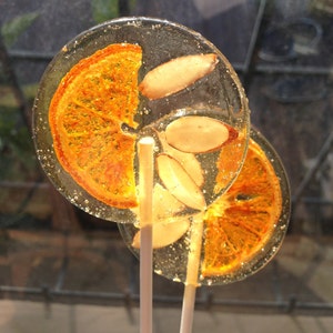 3 Italian Bergamot Party Favors Lollipops With Tangerine Slices And Slivered Almonds image 1