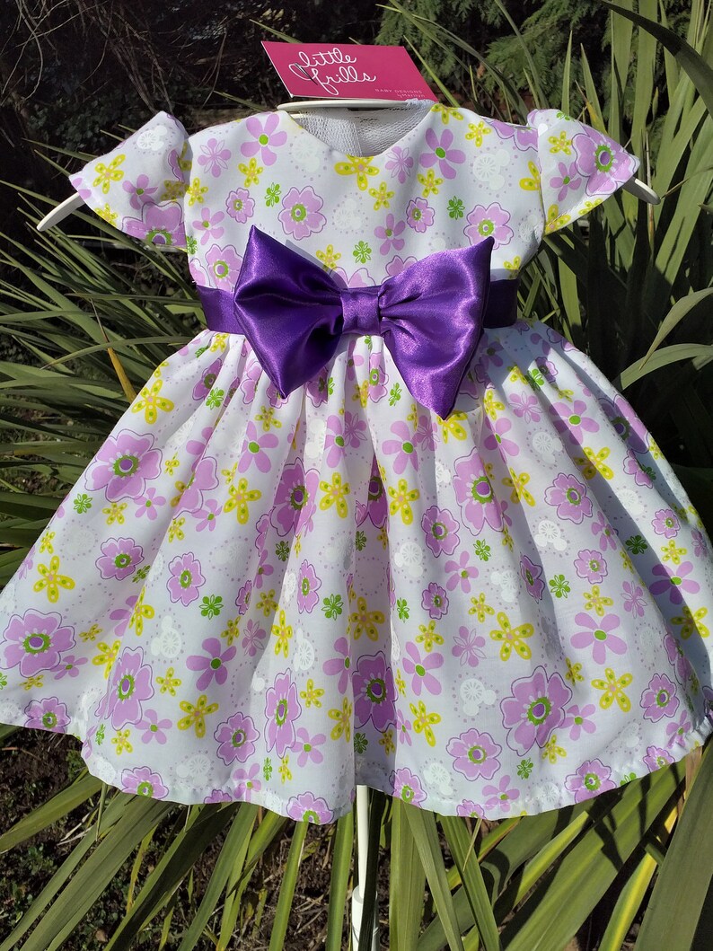 Purple Bow Baby Dress image 1