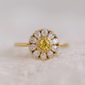 Daisy solitaire engagement ring