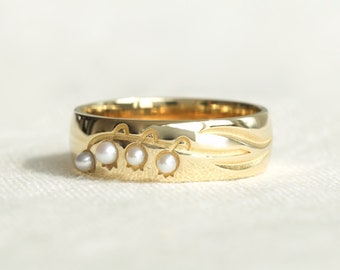 Lelietje-van-dalen-ring, statement-ring, bandring, bloemenring, lelietje-van-dalen-sieraden, gouden ring, zilveren ring, parelring