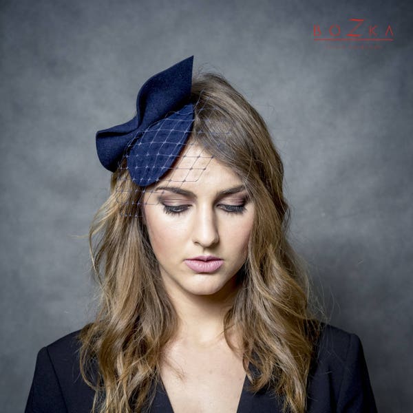 Navy blue mini pill box hat with bow and piece of netting, dark blue fascinator, felt headpiece, small navy hat