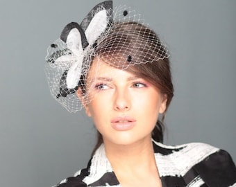 Black and white fascinator with petals and spotted veiling, wedding fascinator with dotted netting, fascinator with netting