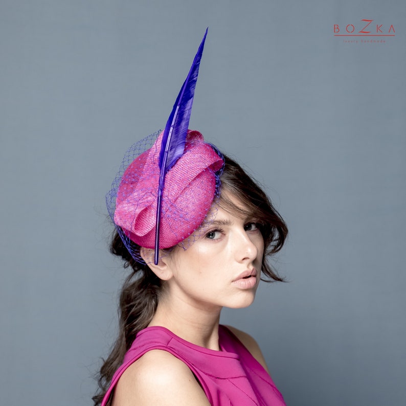 race hat in fuchsia nad purple color Fuchsia pill box hat with violet long feather and netting cocktail beret with long feather and veil