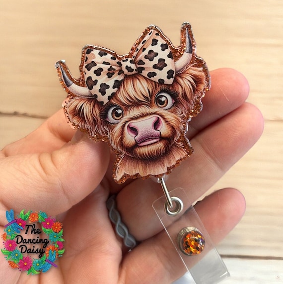 Highland Cattle with bow - cow badge reel