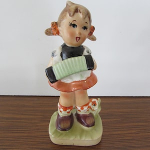 Vintage Girl with Accordion Figurine: Made in Japan
