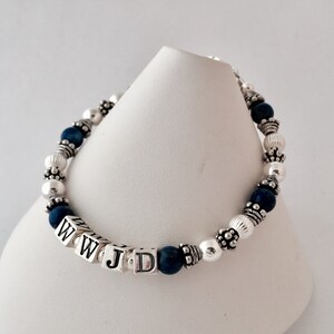 Lapis Lazuli and Sterling Silver What Would Jesus Do, WWJD, Sterling Silver or Gold, Lapis Beaded Bracelet, W.W.J.D Jewelry, WWJD?, Personal Religious Gifts. Shown with dark blue Lapis Lazuli beads and a lobster claw clasp.