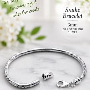 May include: A 3mm .925 sterling silver snake bracelet with a lobster claw clasp and a detachable end cap. The text reads: You may add a Snake Bracelet or just order the beads. Snake Bracelet 3mm .925 STERLING SILVER.