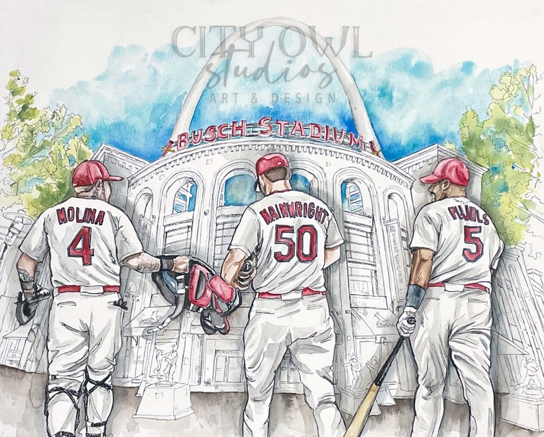 May include: Watercolor painting of three baseball players wearing red and white uniforms with their numbers on the back. The players are standing in front of Busch Stadium in St. Louis, Missouri. The stadium's iconic arch is visible in the background.