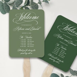 May include: Two green wedding fans with white text. The fans feature the text "Welcome to the wedding of Rebecca and Edward" and a timeline of events for the wedding day. The fans are made of paper and have wooden handles.