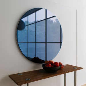 Dark blue glass wall mirror. Cobalt blue Art Deco style wall mirror. Custom blue glass mirror