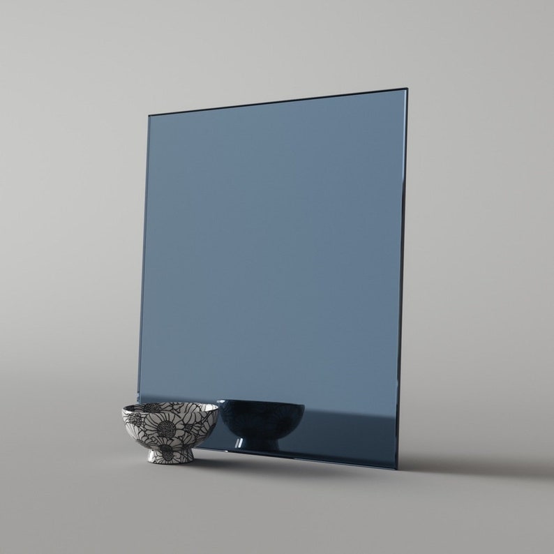 Gray Blue Mirror Swatch. Custom blue mirror that can be used in furniture and other design projects made in our California studio 