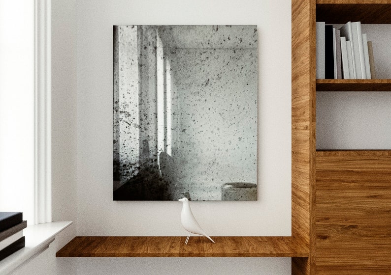 Cloudy antiqued mirror made with handmade antiqued mirror