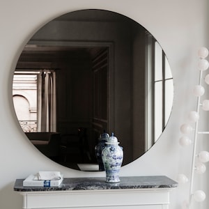 Custom 24 x 72 version of this mirror with black matte metal finish