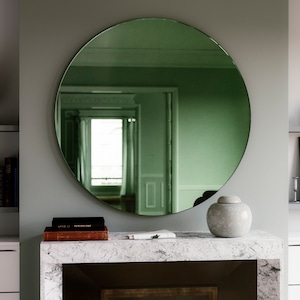Green Deco mirror.  Diameter round Art Deco Inspired green Wall Mirror. 1920s and 30s inspired furniture.