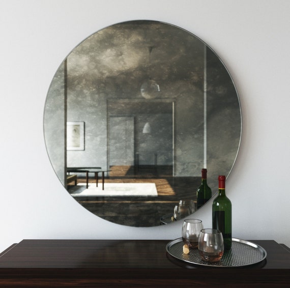 48 Antiqued Wall Mirror Decorative That Casts An Interesting Cloudy Reflection Of Room Round With European Chic Design